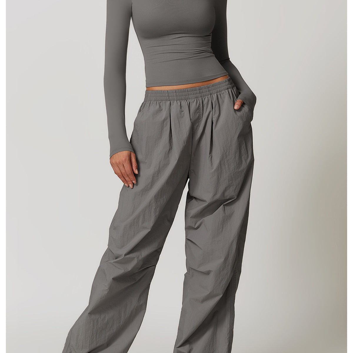 Gray long-sleeved top and parachute pants outfit for langry fashion and ملابس casual style