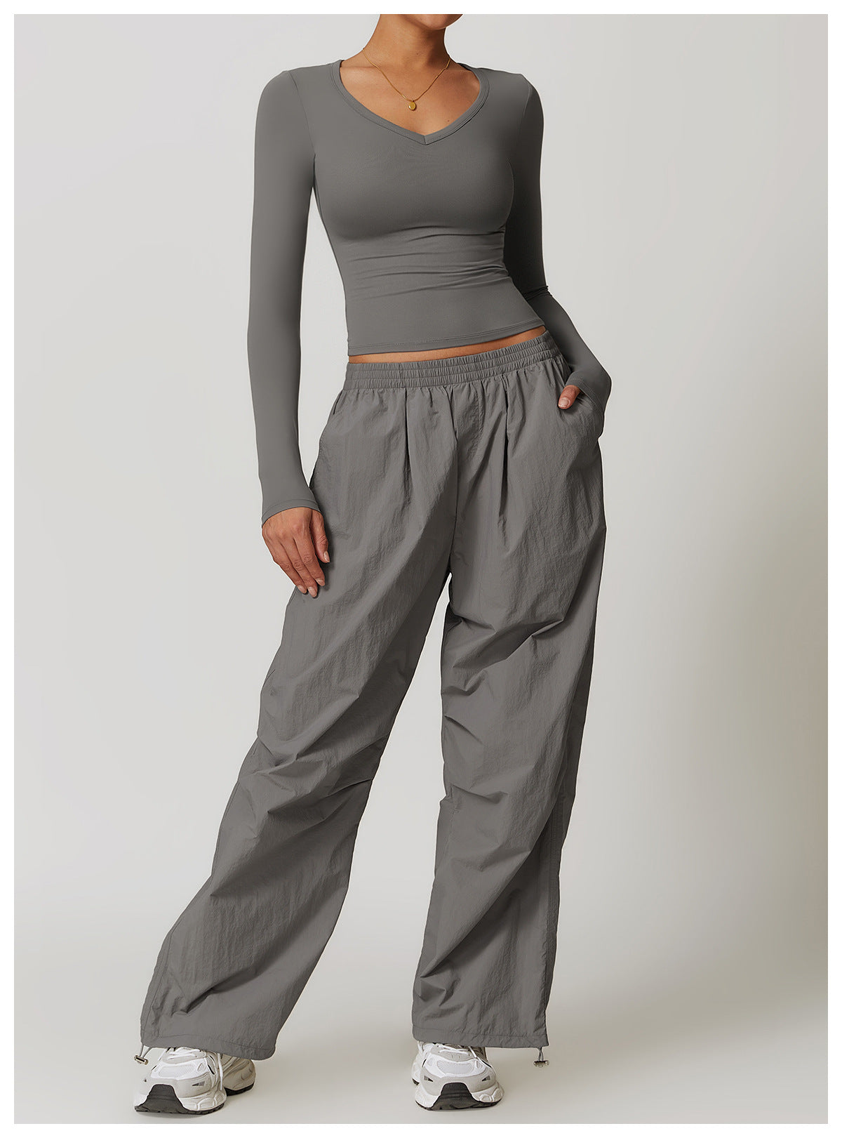 Gray long-sleeved top and parachute pants outfit for langry fashion and ملابس casual style