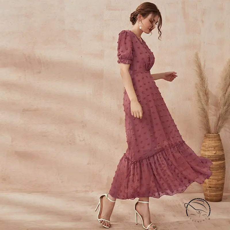 Flowing mauve short sleeve Langry midi dress with dotted pattern and ruffled hem
