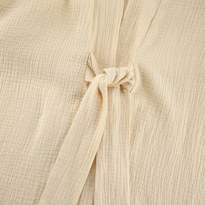 Close-up of beige textured cotton fabric with tie-closure for Winter Pure Cotton Pajamas