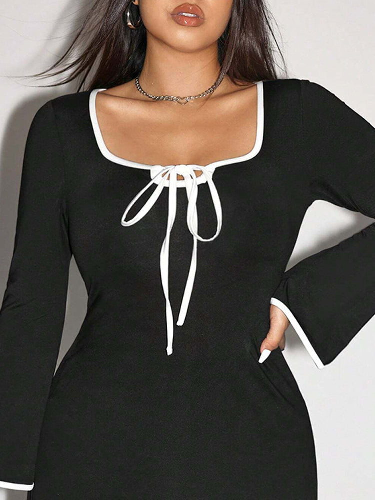 Elegant Sweet Spicy Dress featuring a black langry dress with white trim, stylish fashion