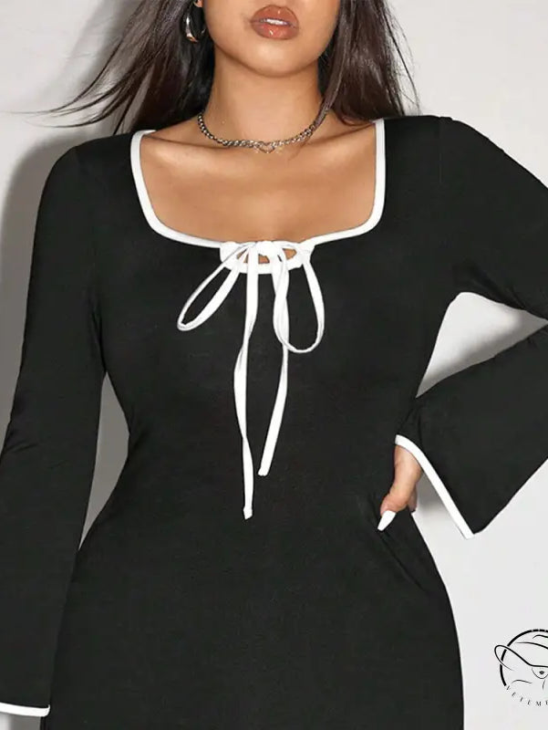 Elegant sweet spicy black dress with white trim