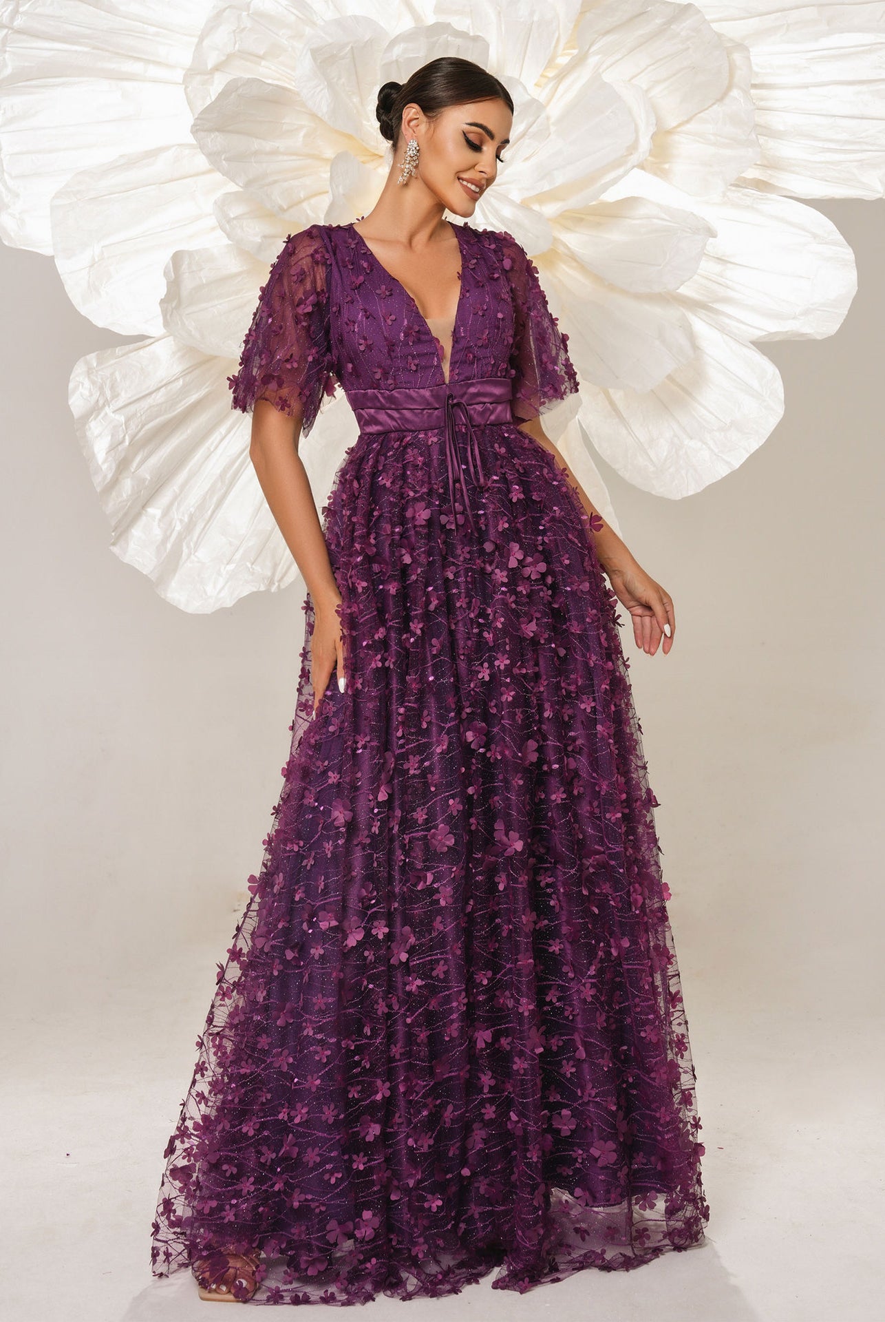 Purple floral-embellished evening gown for stylish women, perfect for formal occasions