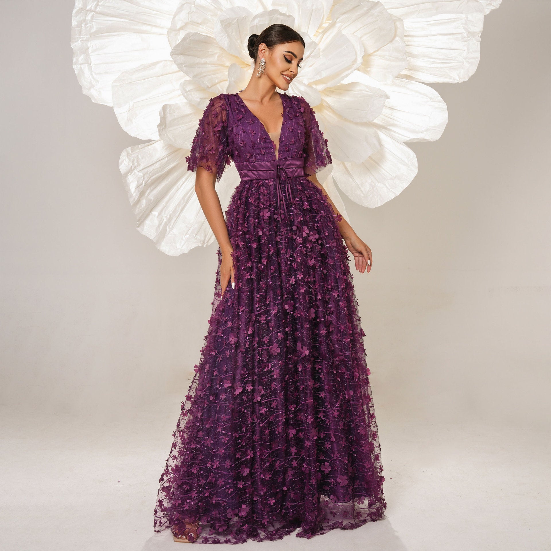 Purple floral-embellished evening gown for stylish women, perfect for formal occasions