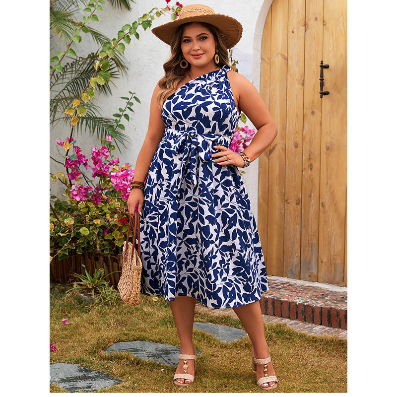 Woman wearing an Elegant Backless Dress in blue and white leaf pattern, a chic fashion choice