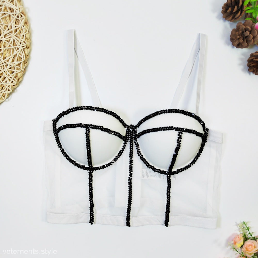 White bustier top with black crystal detailing in glasses-like pattern for Crystal Corset