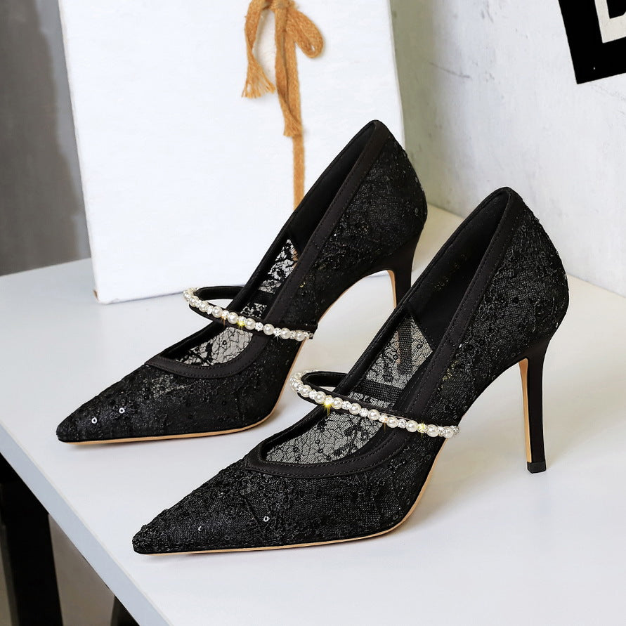 Langry black lace stiletto heels with pearl accents and pointed toes