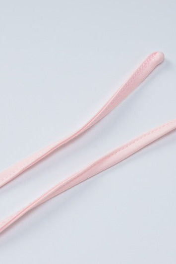 Pink fabric straps on sexy halter low cut ruffled dress, stylish and elegant