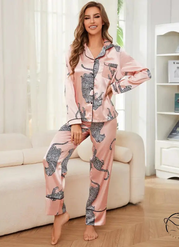 Women’s pink satin winter animal long sleeved pajama set with black leopard print