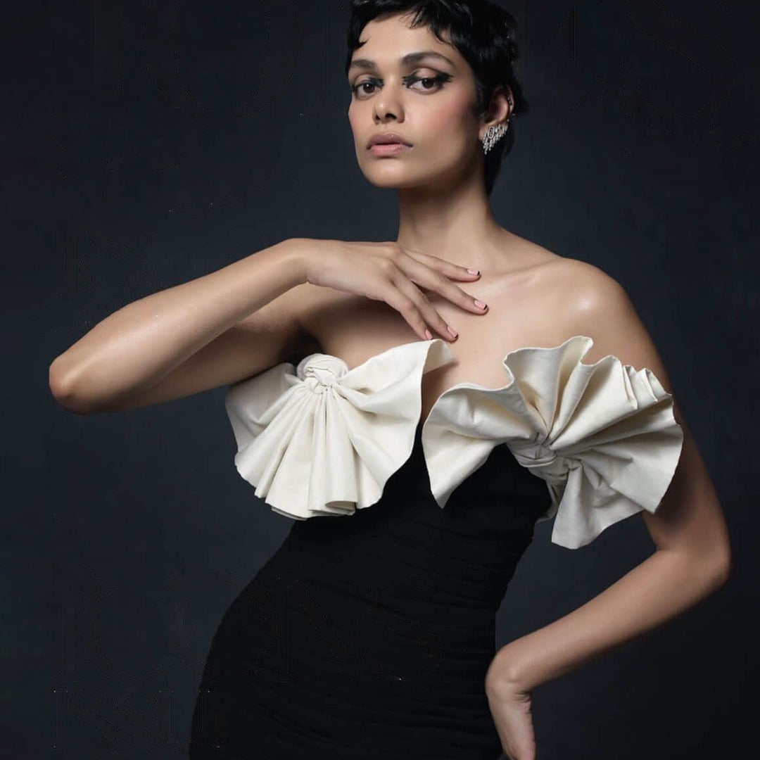 Elegant Black White Strapless Dress featuring dramatic pleated ruffles for fashion enthusiasts