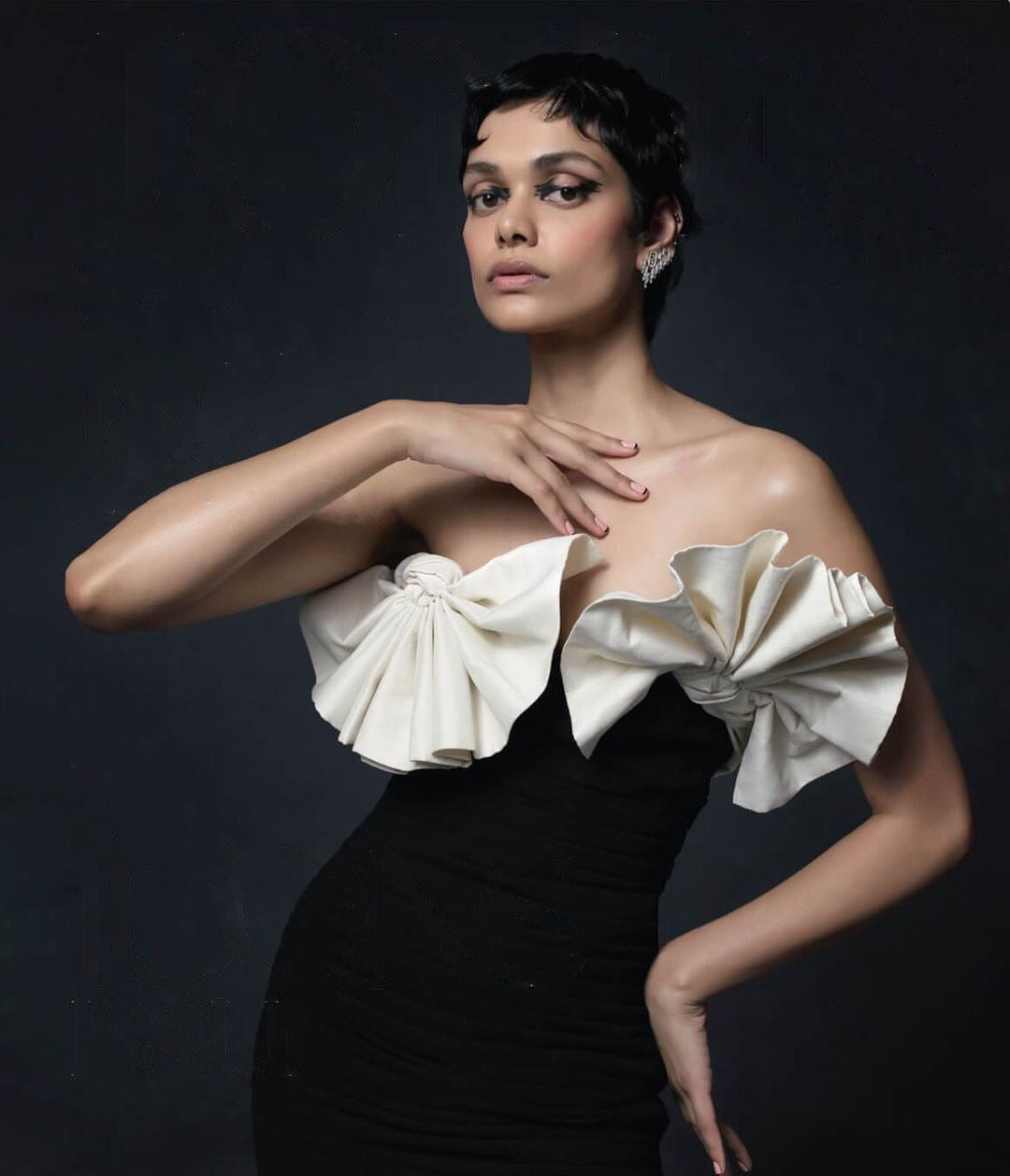 Elegant Black White Strapless Dress featuring dramatic pleated ruffles for fashion enthusiasts