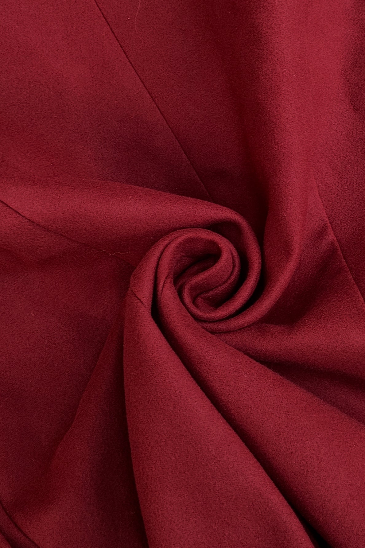 Elegant red silk fabric with sheen in double breasted long coat fashion