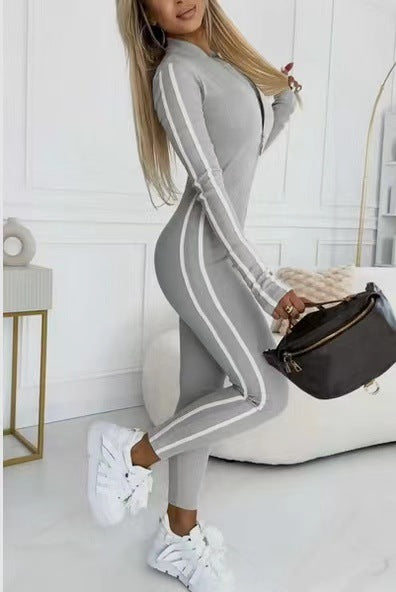 Winter slim striped gray jumpsuit with white stripes, perfect for stylish winter wear