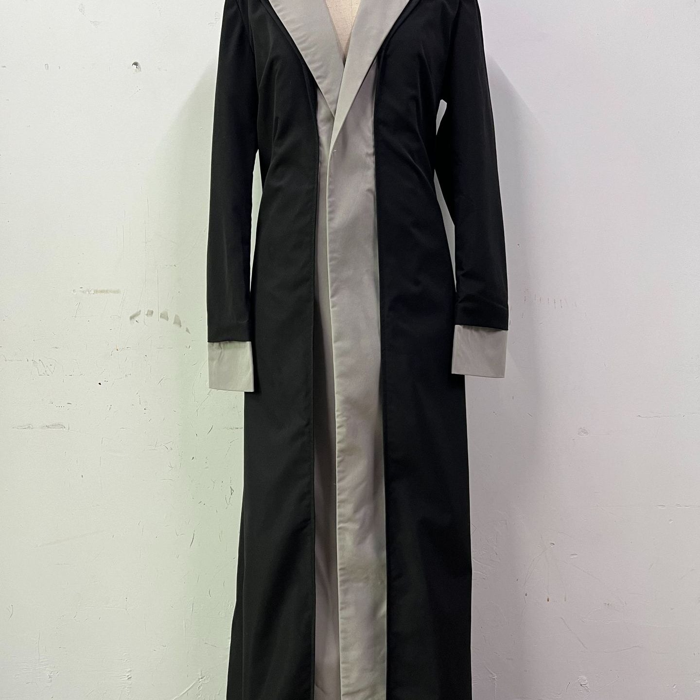 Black and silver abaya trench coat with high collar stitching and contrast color