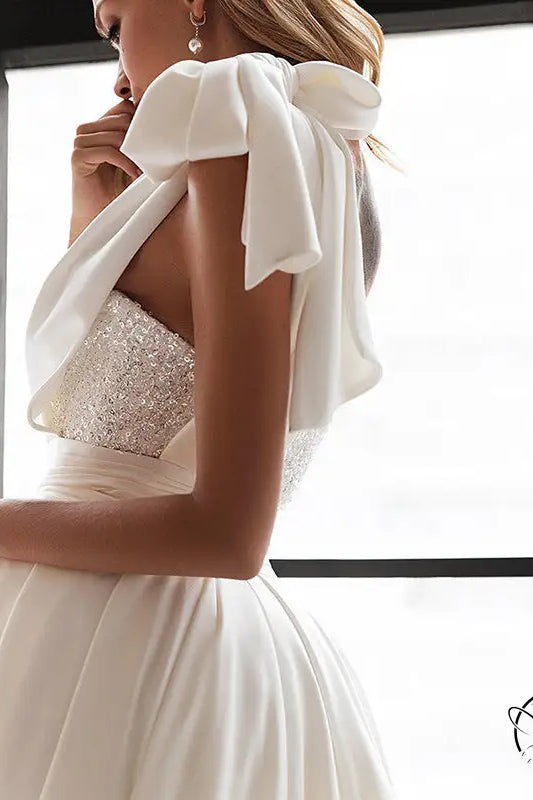 Elegant white slim fit dress with sequined bodice