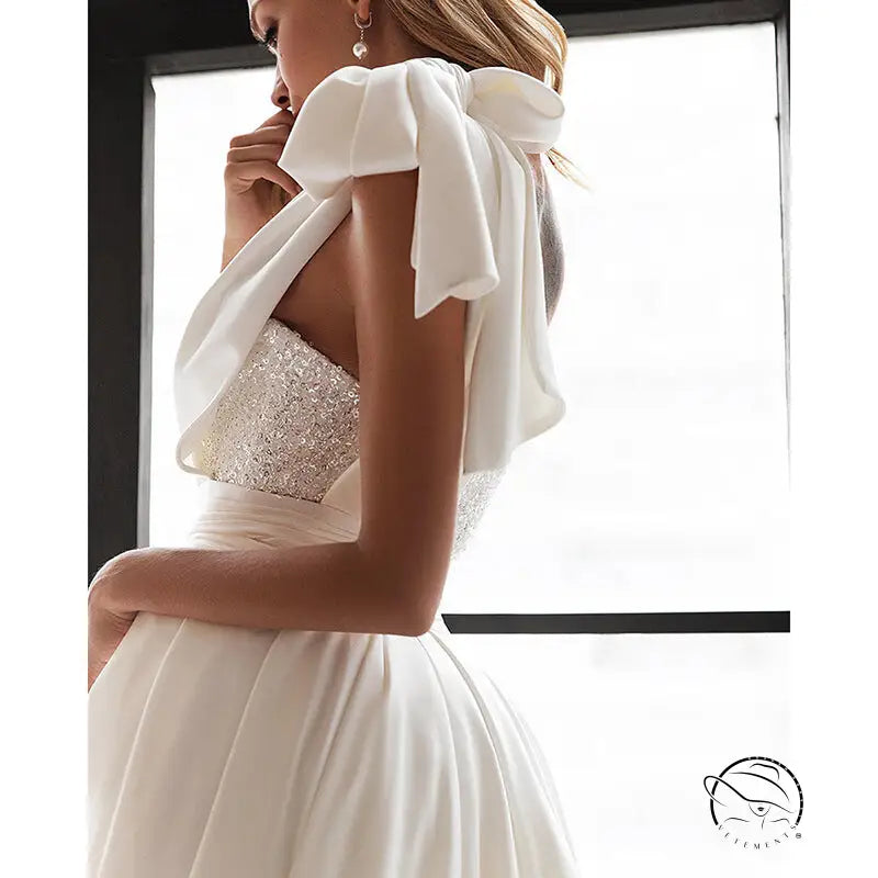 Elegant white slim fit dress with sequined bodice