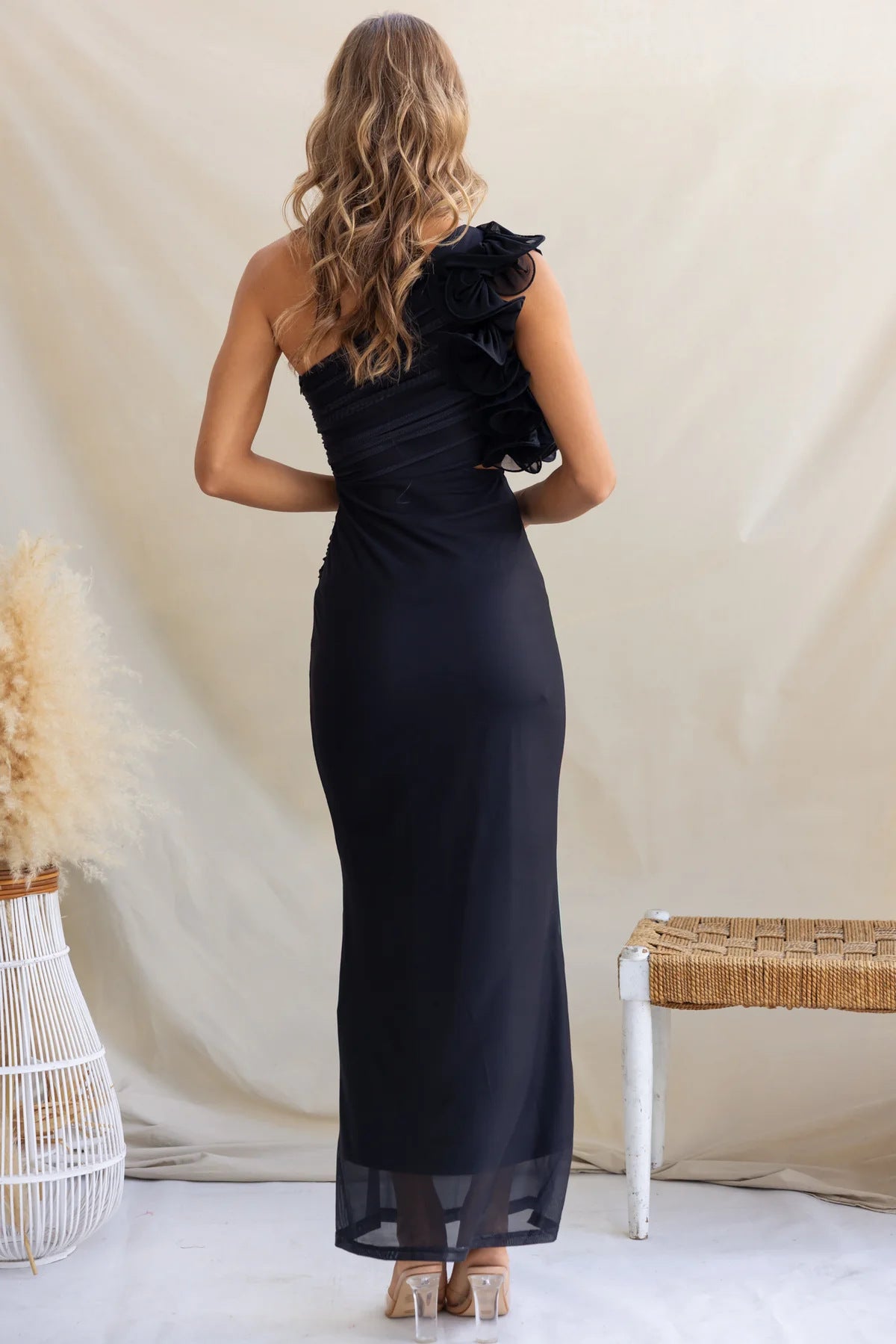 Black one-shoulder maxi dress showcasing elegant langry fashion and stylish ملابس