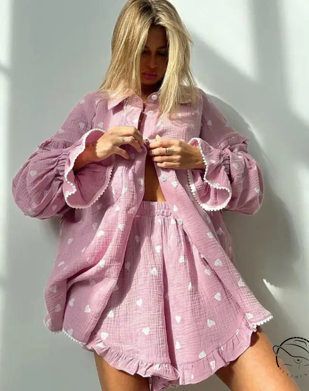 Light pink heart-patterned pajamas set with ruffled trim