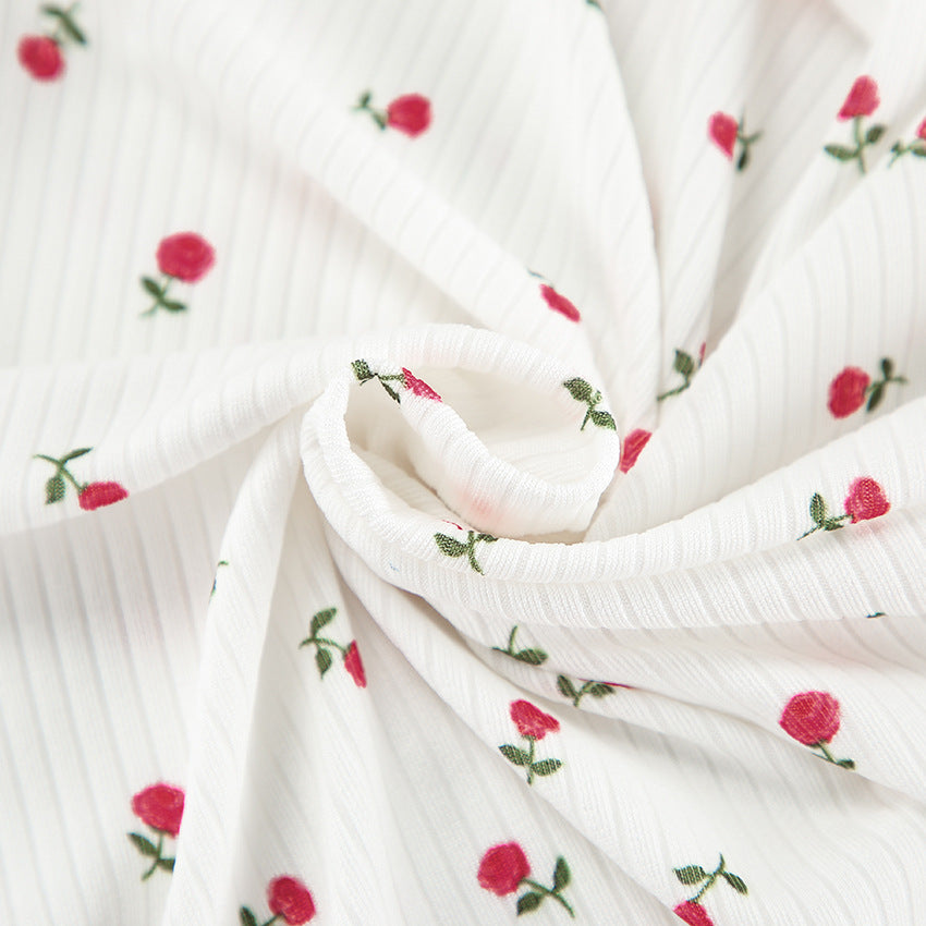 White ribbed fabric with embroidered red roses and green stems for fashionable ملابس lady homewear