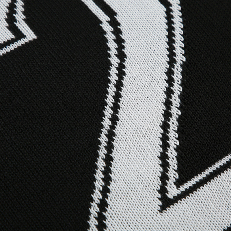 Black and white knitted pattern on Langry winter loose pullover sweater, stylish ملابس for fashion