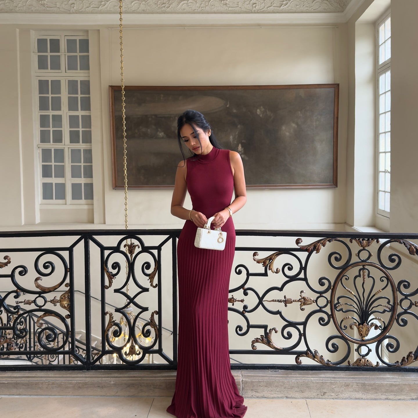 Burgundy pleated floor-length maxi dress with cap sleeves, perfect for elegant fashion