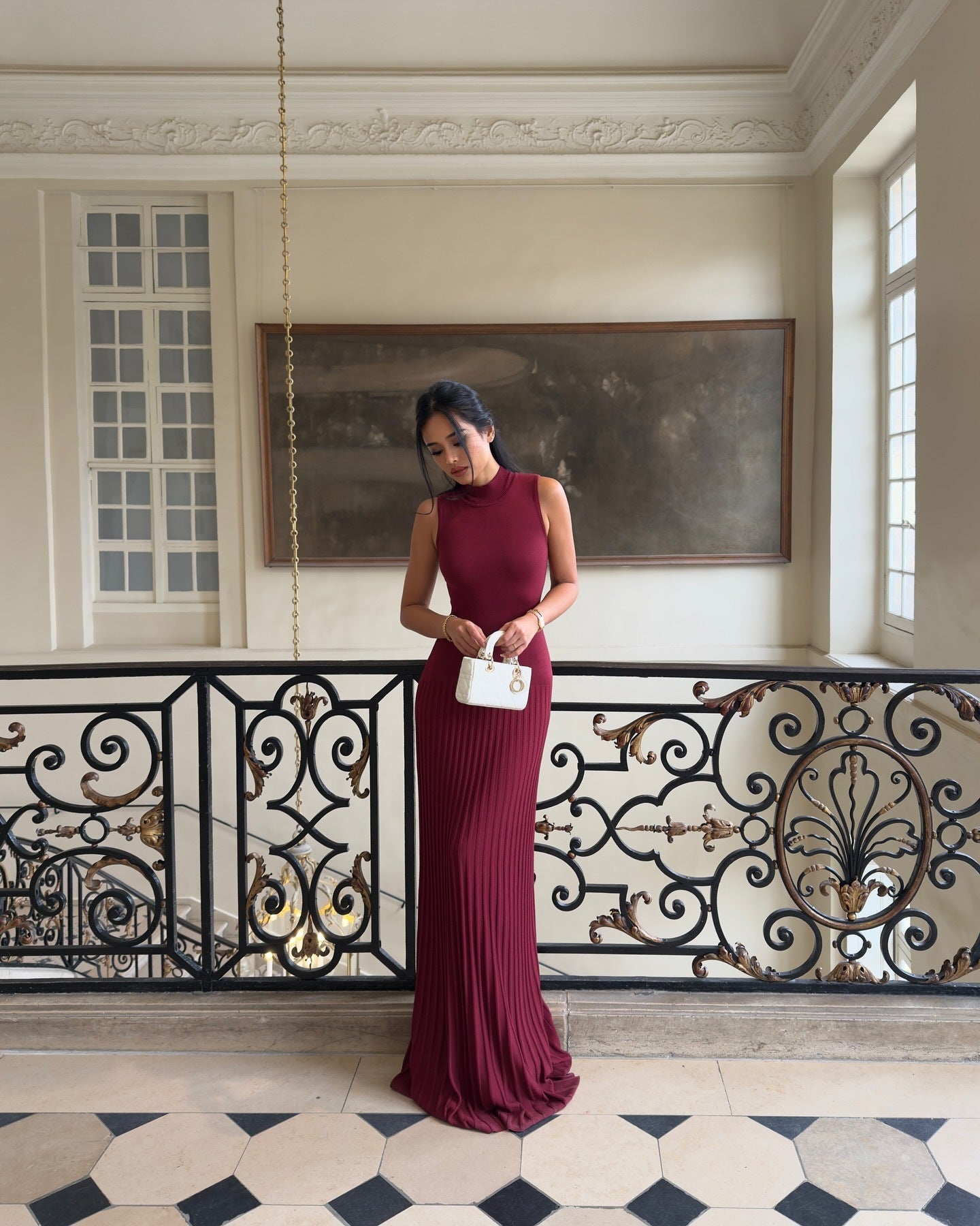 Burgundy pleated floor-length maxi dress with cap sleeves, perfect for elegant fashion