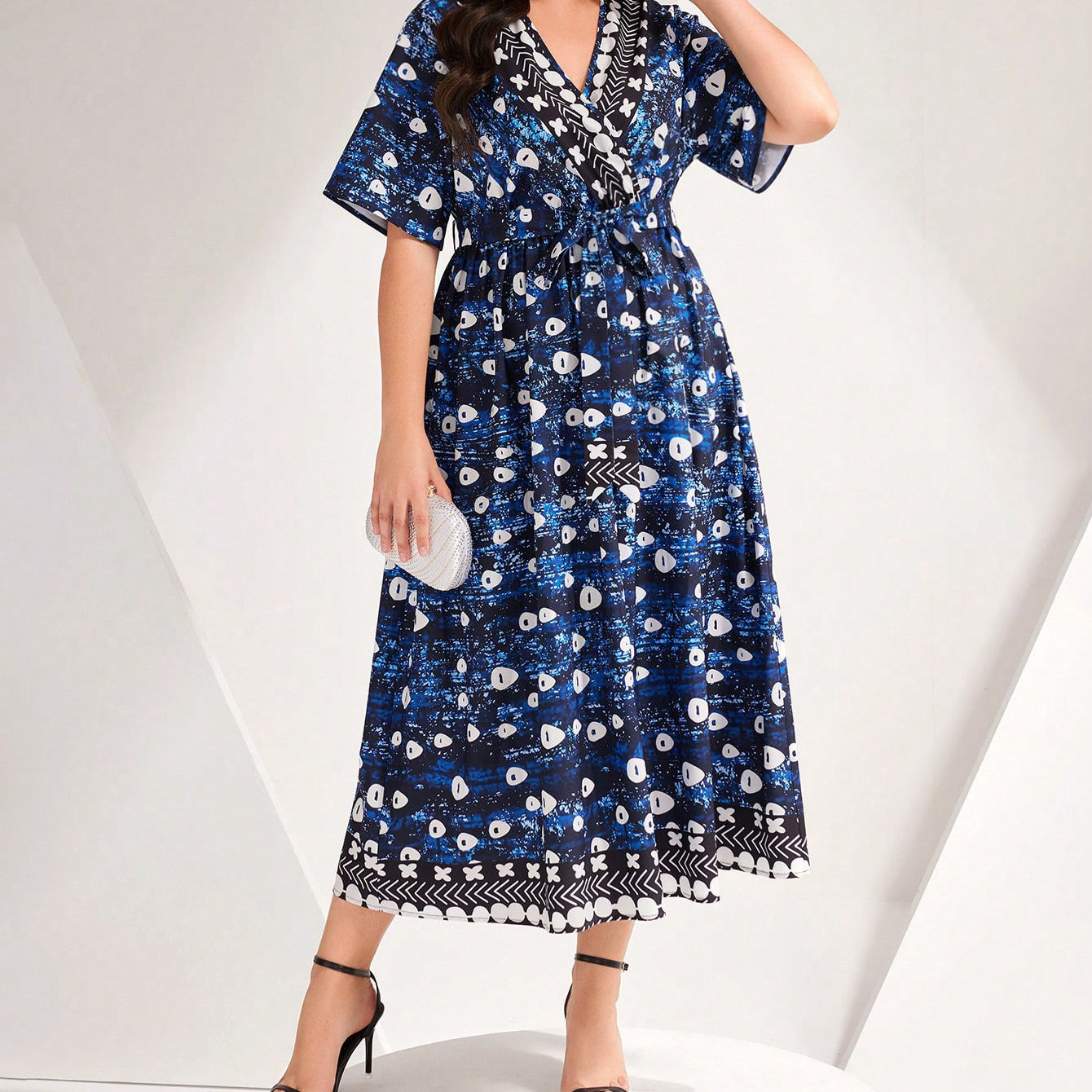 Beautiful Blue Printed Tied Dress featuring a stylish blue and white pattern in fashion ملابس