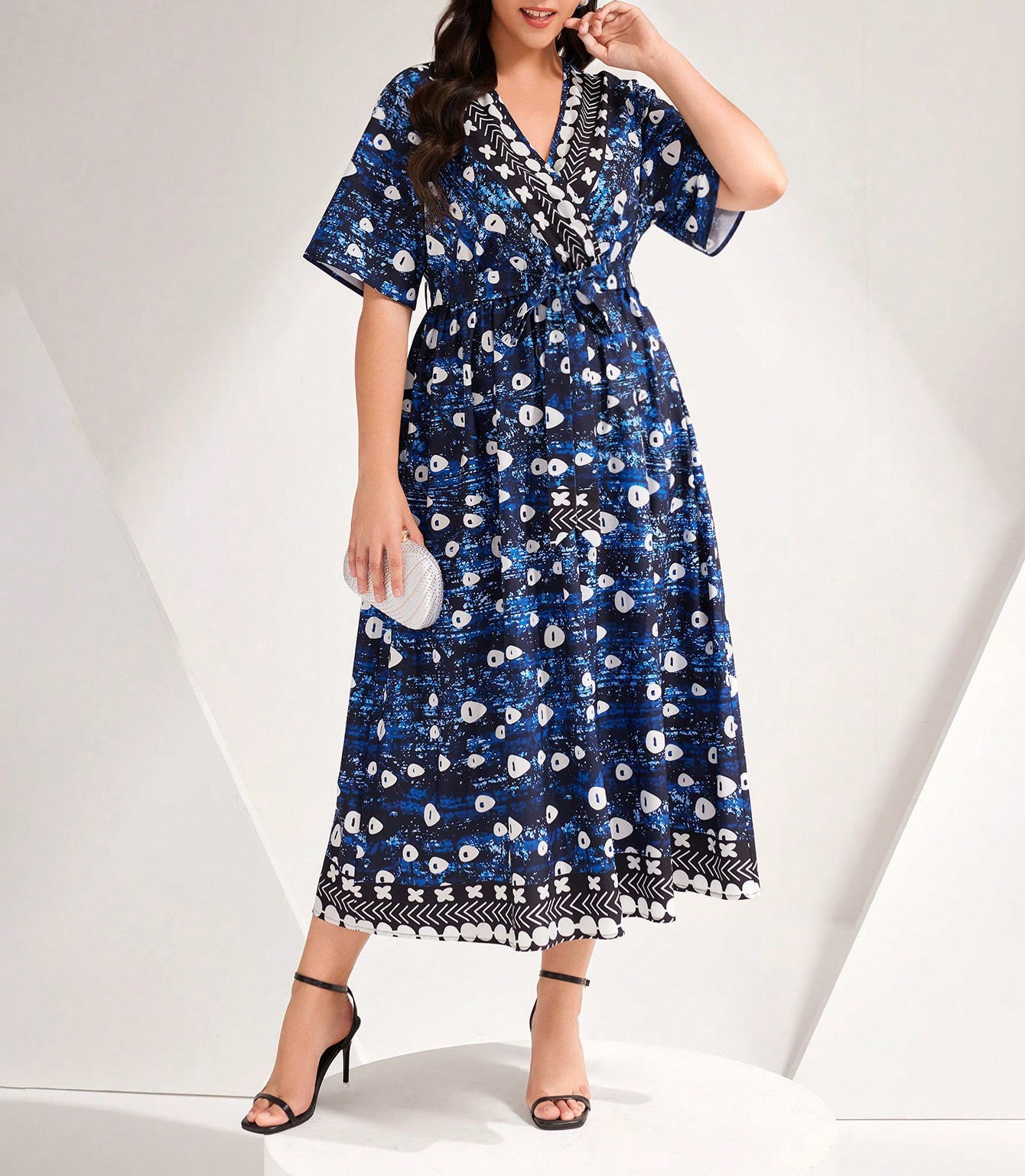 Beautiful Blue Printed Tied Dress featuring a stylish blue and white pattern in fashion ملابس