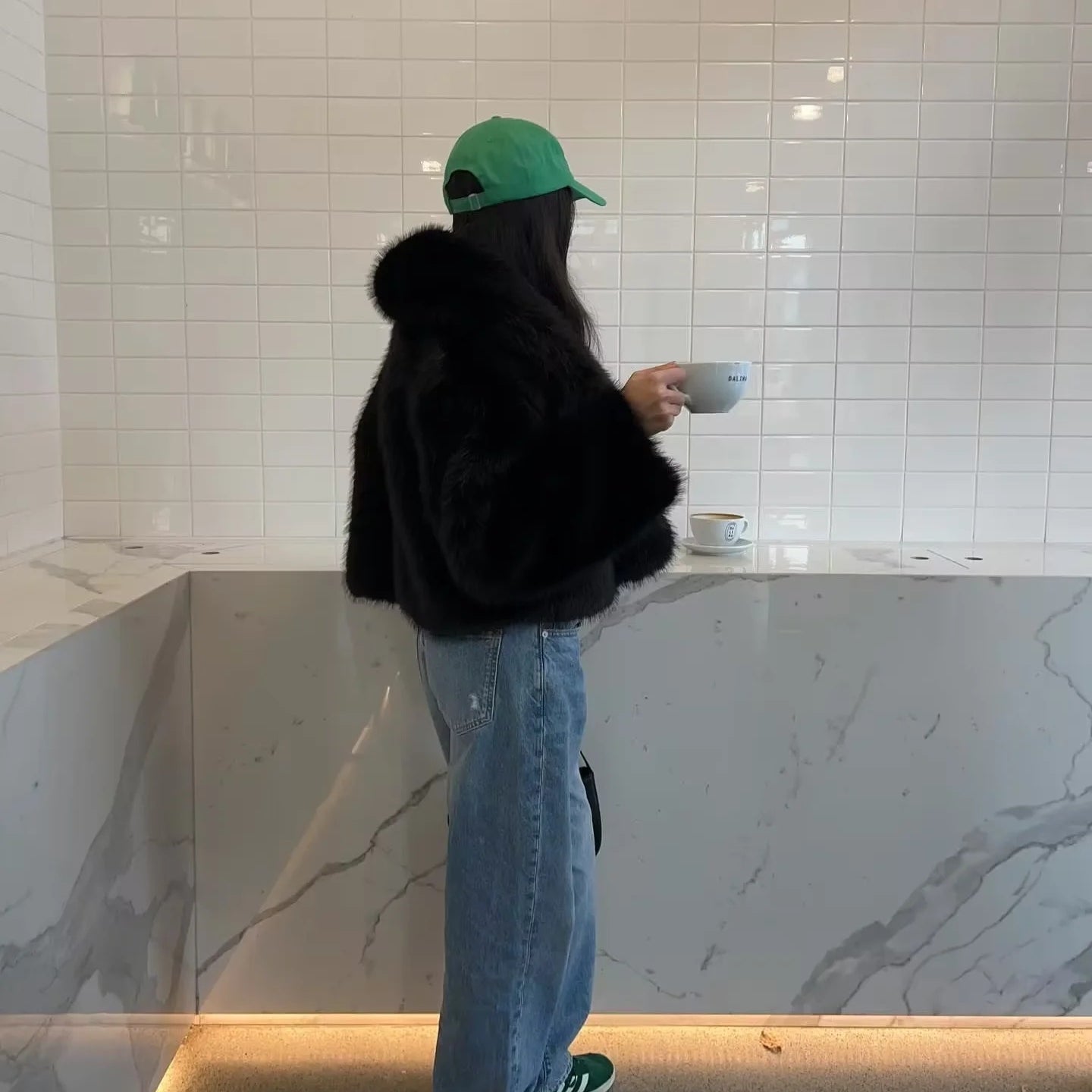 Green adidas sneakers with faux fur accents in langry fashion