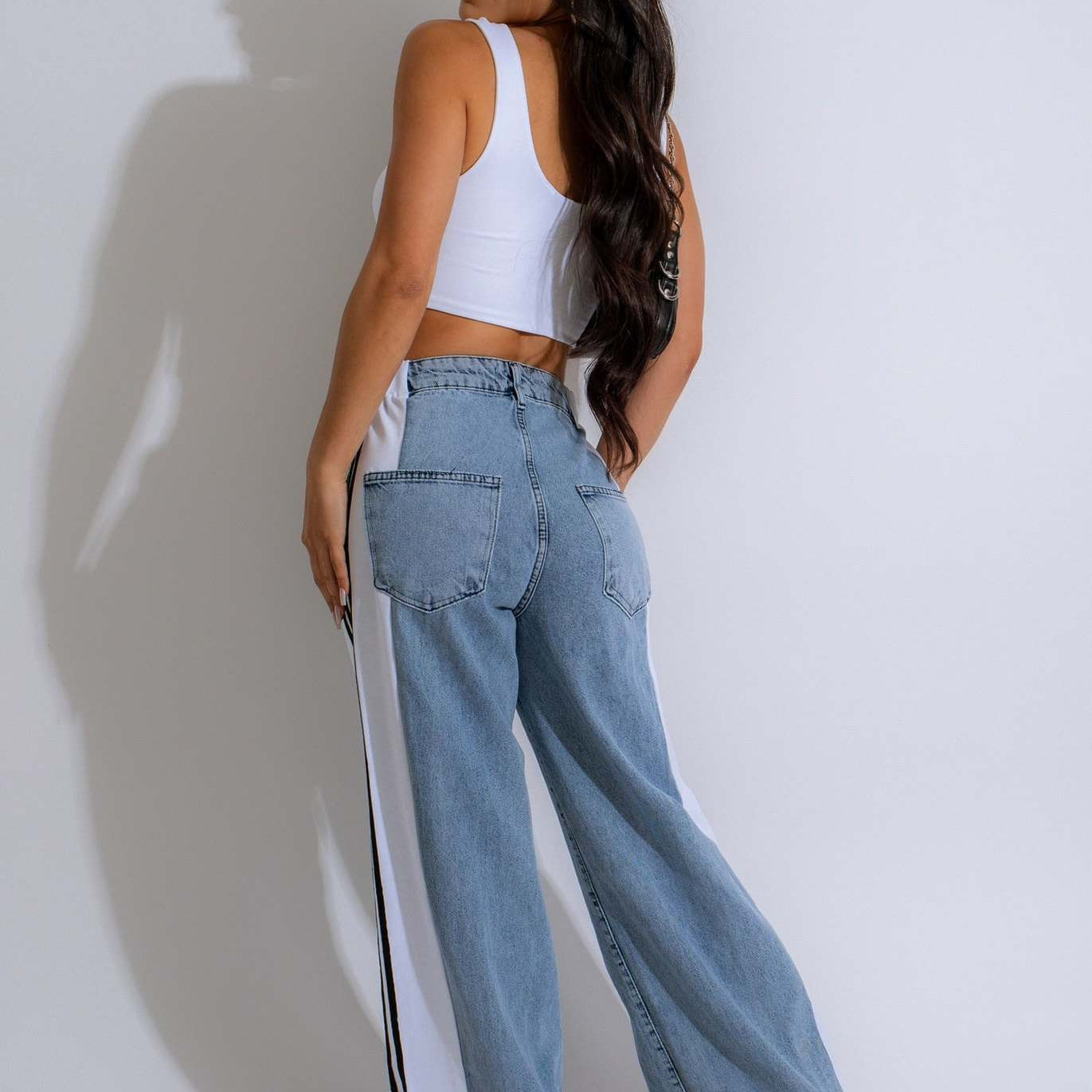 Wide-leg light blue jeans with white side stripes for casual fashion and ملابس style
