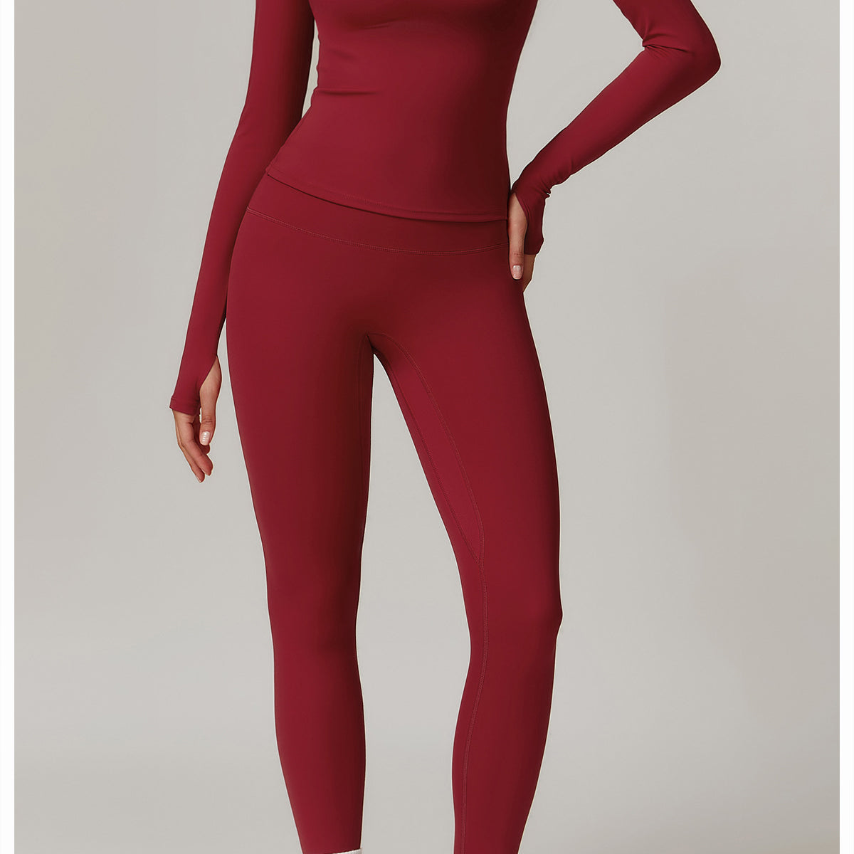 Burgundy long-sleeved athletic jumpsuit for outdoor running sports fashion ملابس