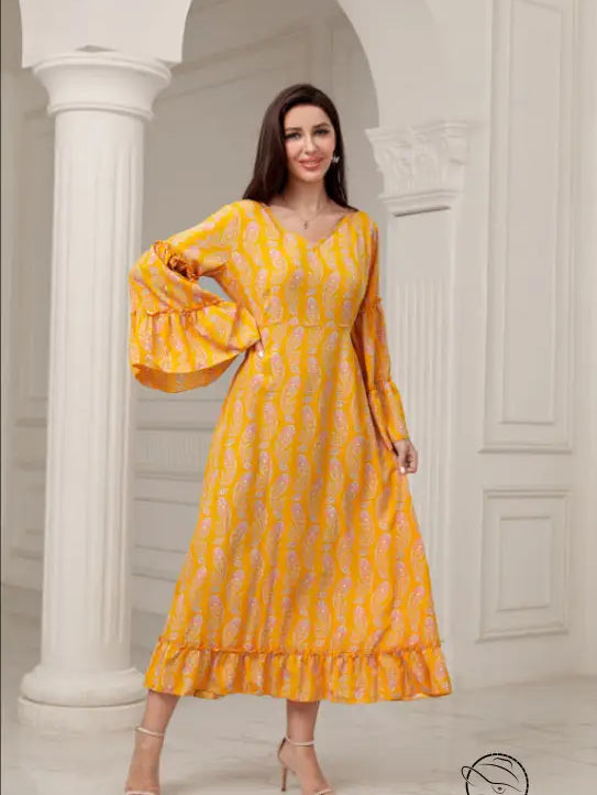 Vibrant yellow langry fashion midi dress with bell sleeves and paisley patterns