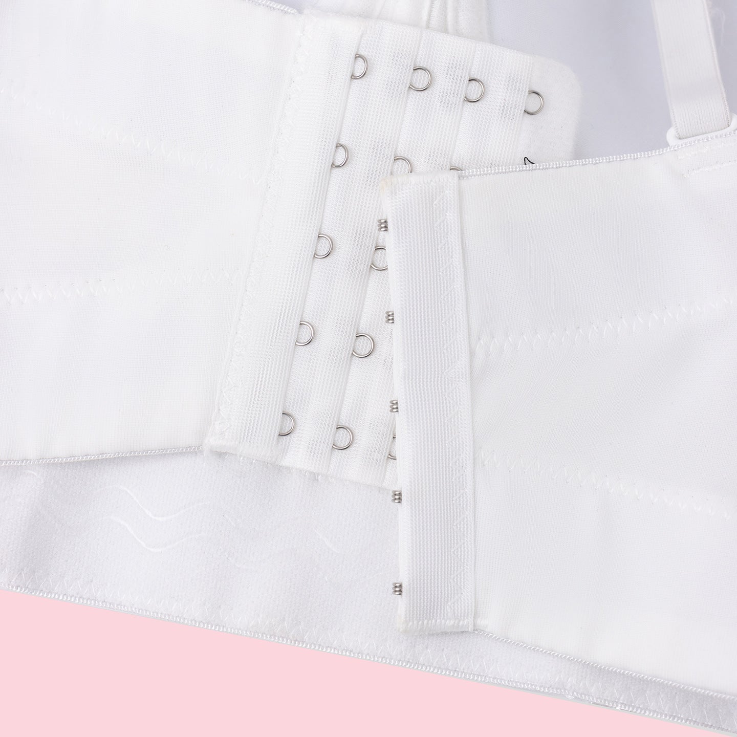 White lace-up Langry fashion suspender belt with silver eyelets