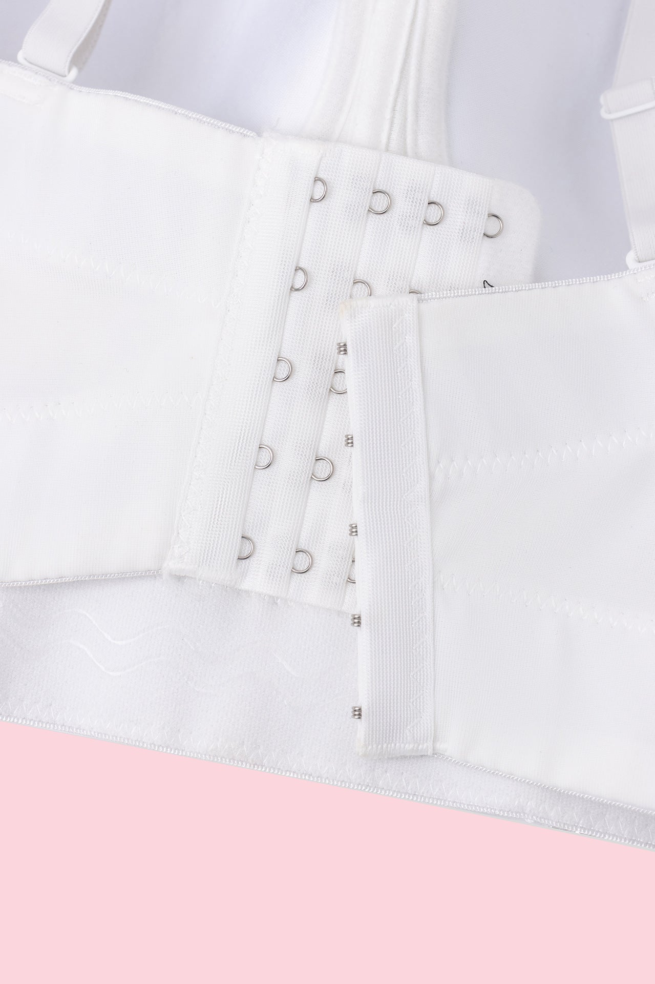 White lace-up Langry fashion suspender belt with silver eyelets