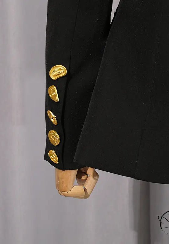 Elegant black Balmain blazer with gold buttons in langry fashion