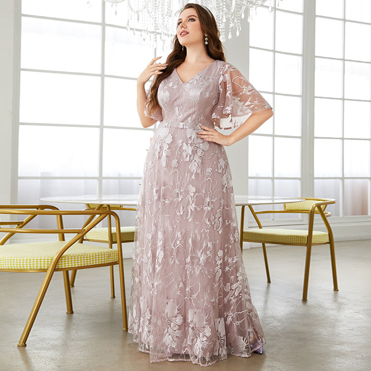 Elegant floral-embroidered mauve evening gown showcasing luxurious fashion and ملابس sophistication