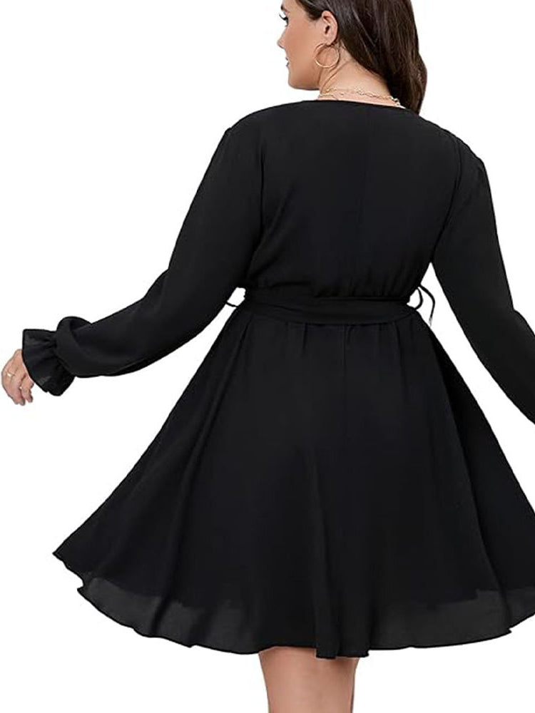 Plus size black wrap dress with ruffled sleeves, ideal for winter office midi wear