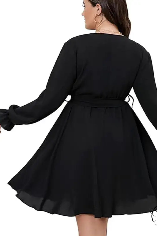 Plus size black wrap winter office midi dress with ruffled sleeves