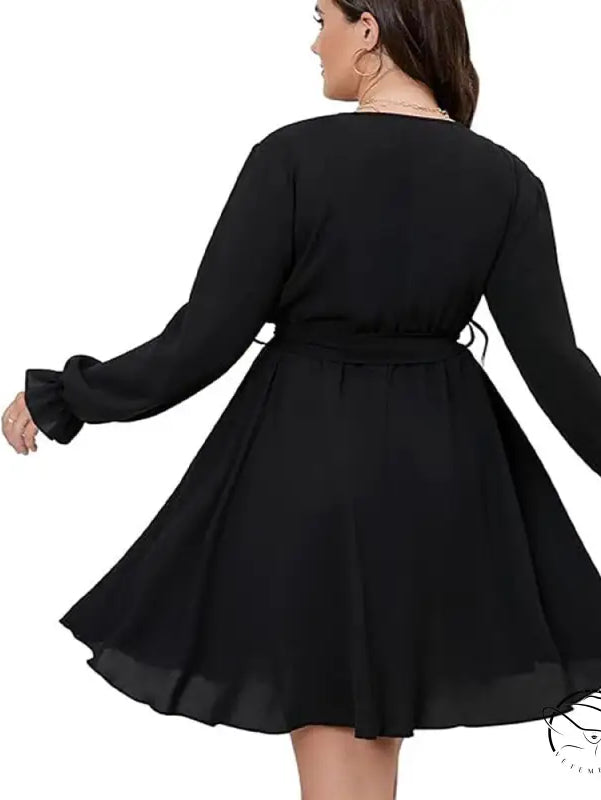 Plus size black wrap winter office midi dress with ruffled sleeves