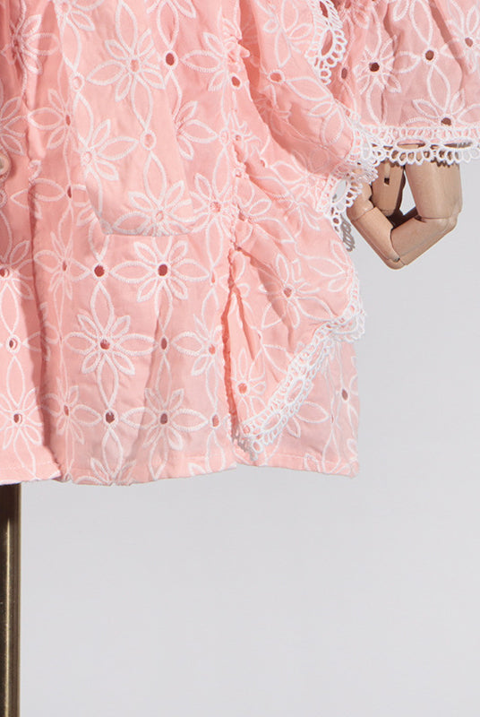 Pink eyelet dress with lace trim featuring stand collar and ruffled short sleeves