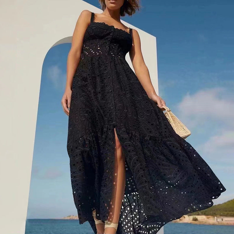 Black eyelet maxi dress featuring a slimming design, perfect for fashionable women