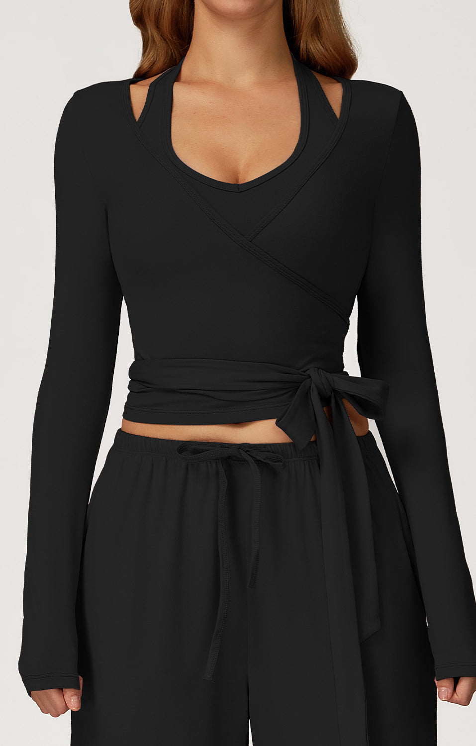 Black Langry cropped yoga top with cutout and tie waistband