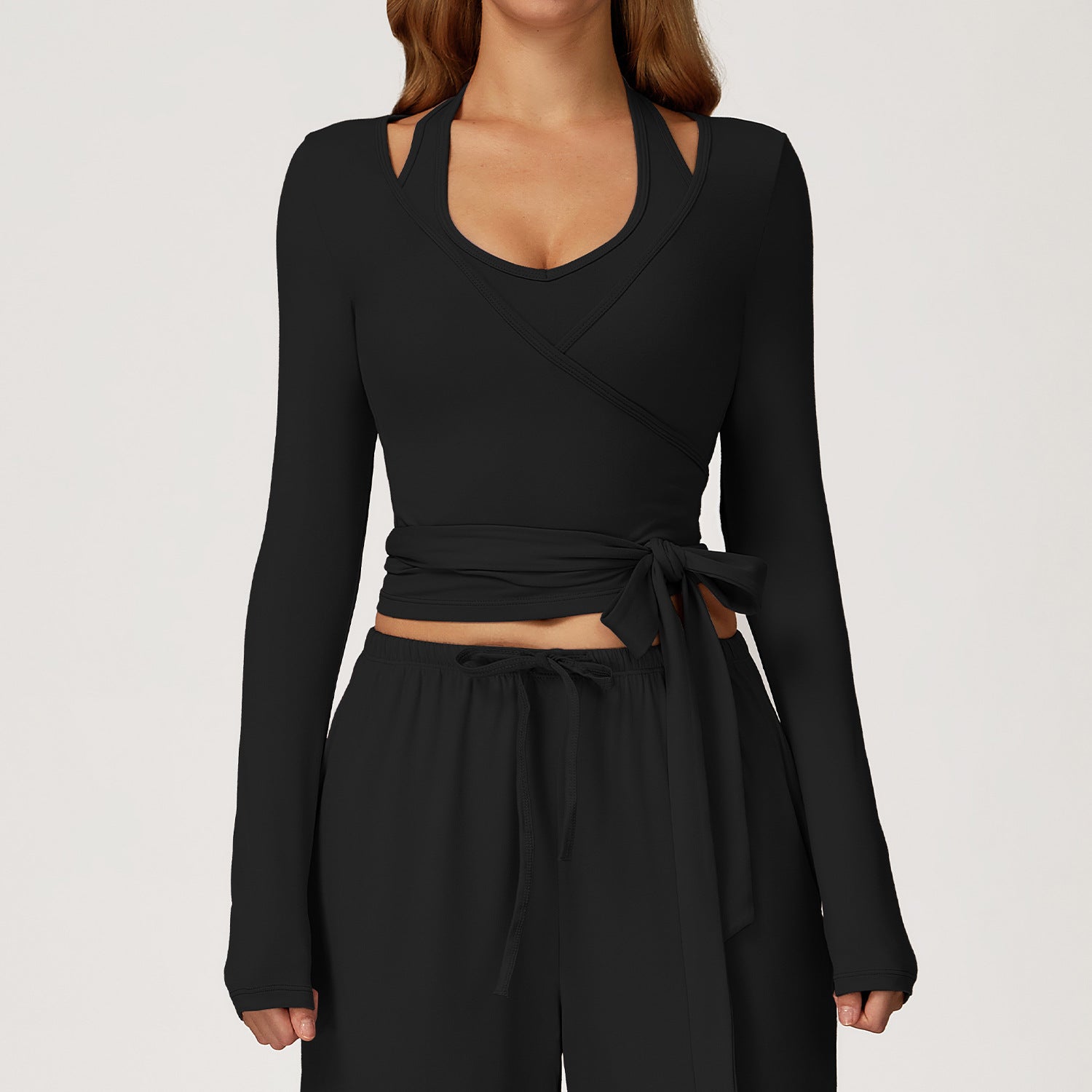 Black Langry cropped yoga top with cutout and tie waistband