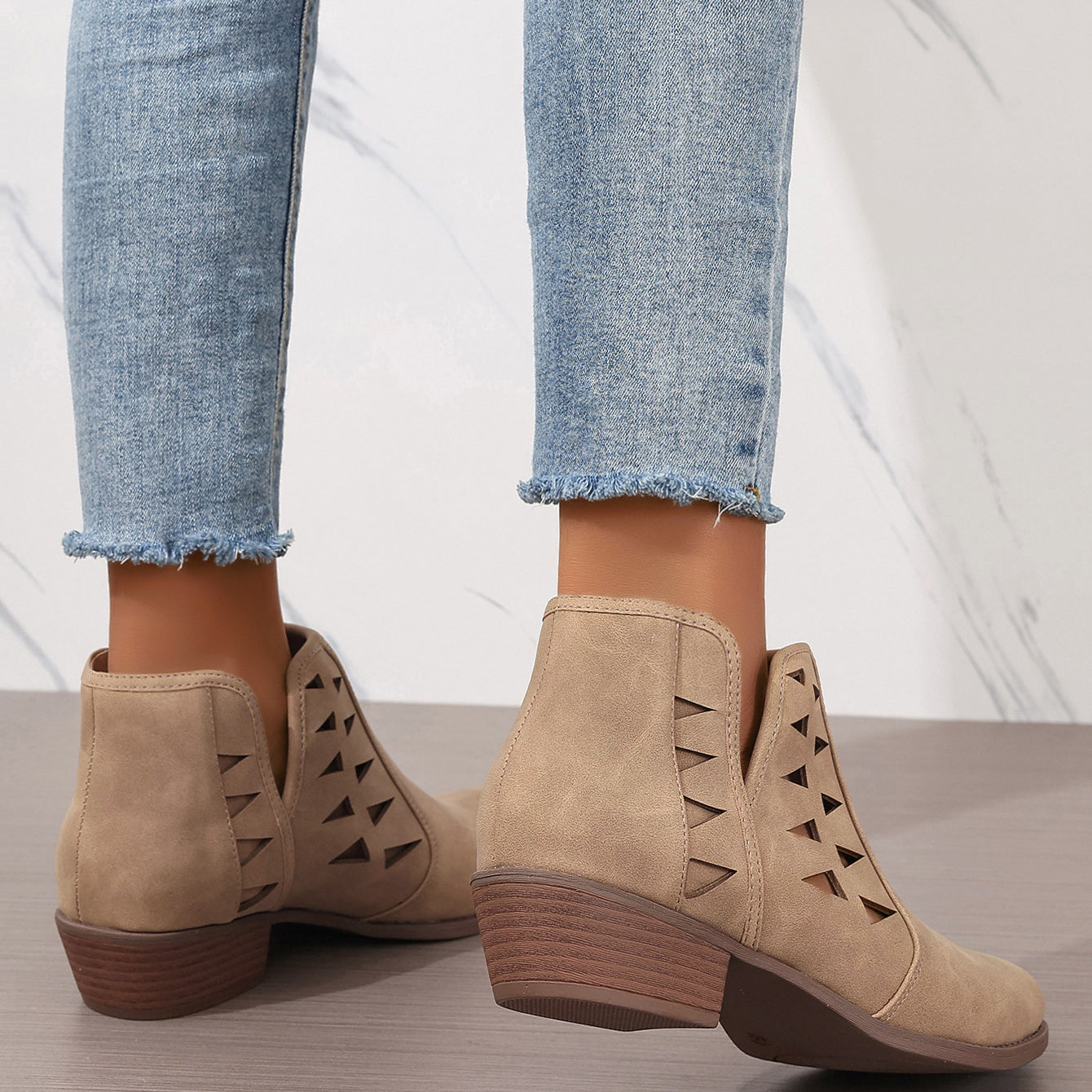 Beige suede Daily Ankle Boots featuring side cutout details and low stacked heels