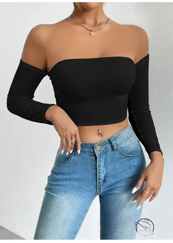 Black camisole waist trimming short sleeve crop top with light blue jeans
