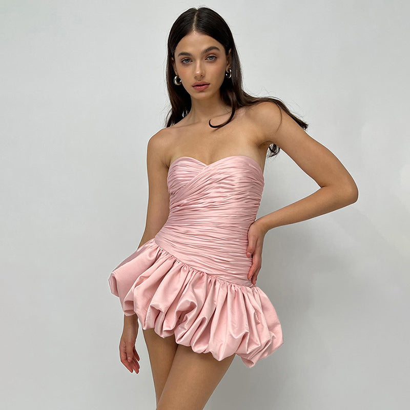 Pink strapless mini dress with ruched bodice, ideal for summer fashion ملابس