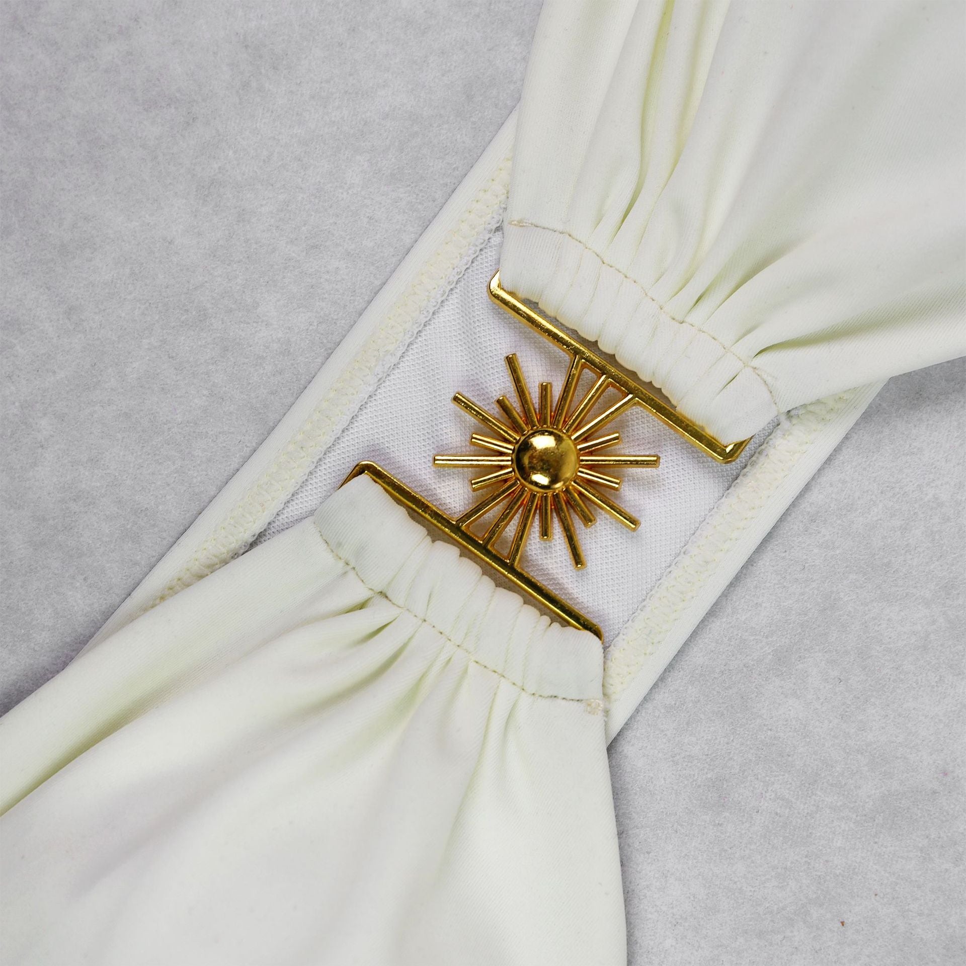 Gold sunburst design on white fabric for Gorgeous White Tube Top Bikini in ملابس fashion