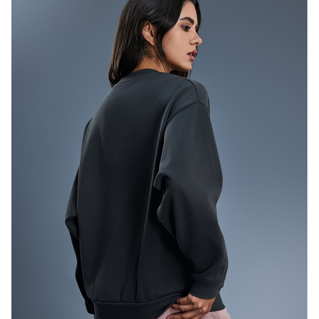 Black long sleeve casual fleece crew neck pullover sweatshirt with ribbed cuffs