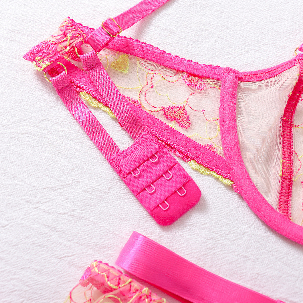 Pink fluorescent embroidery lingerie set with floral lace and garter belt