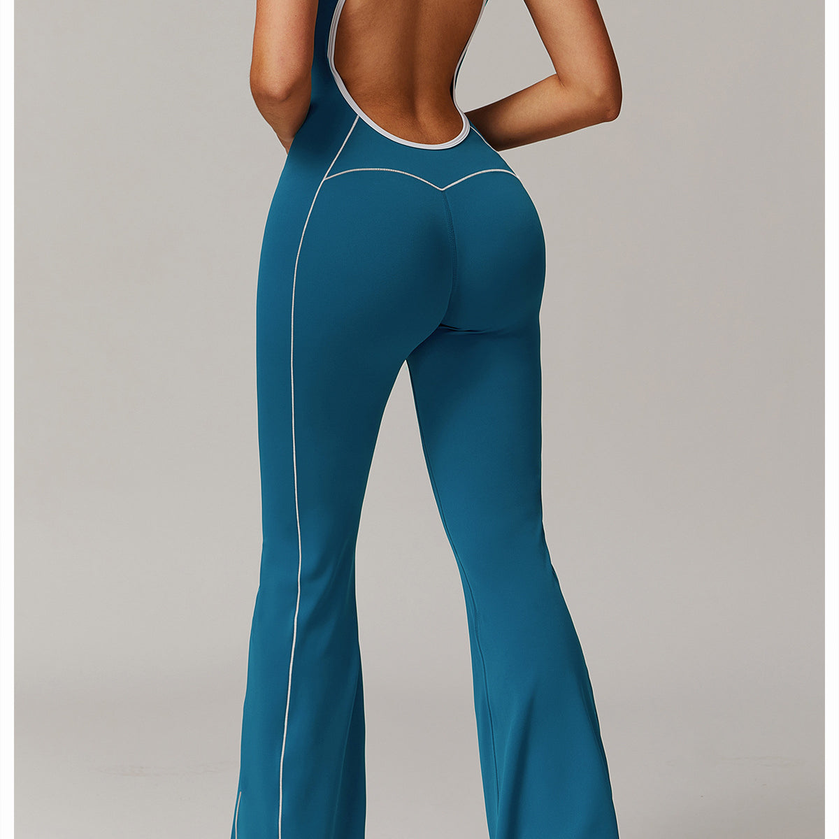 Blue open-back jumpsuit from Hip Lifting Pleated Slightly Pull Yoga Jumpsuit fashion collection